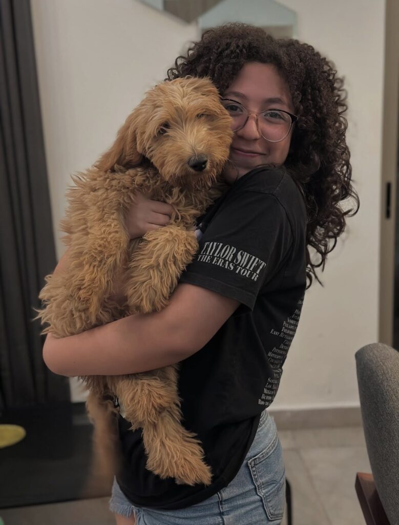 f1b Goldendoodle with girl in mexico