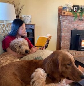 Libby with the dogs during a storm.