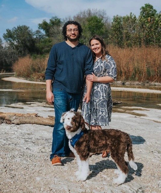 Wax the F1 Bordoodle with his family in Austin, Texas