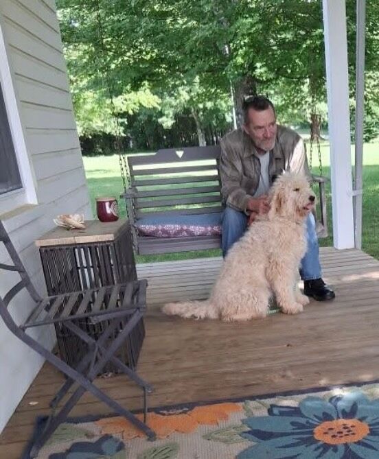 Donny with his English Cream Goldendoodle, Dede. Wonderful life in Tennessee up on the mountain! #lostcreekdorothy #englishcreamgoldendoodle #lostcreekgoldendoodles #tennesseedoodles #tennesseegoldendoodles #tennesseedogs
